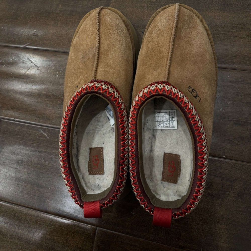 UGGs women 
Men size 8 higher level heel